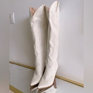 Chic knee high cowboy heel boots in creamy white!